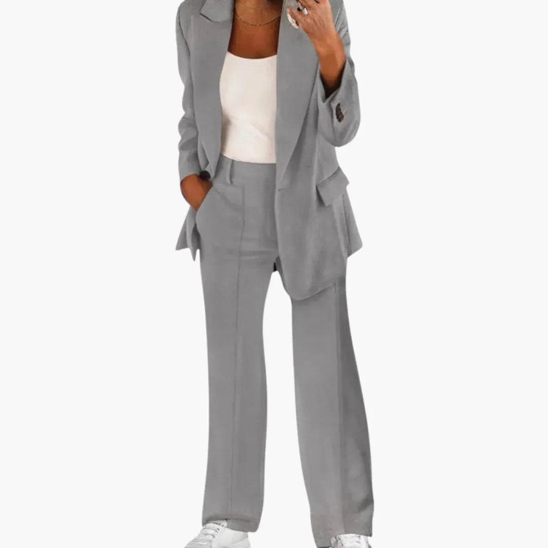 Garnitur damski dwuczęściowy z długą marynarką i szerokimi spodniami