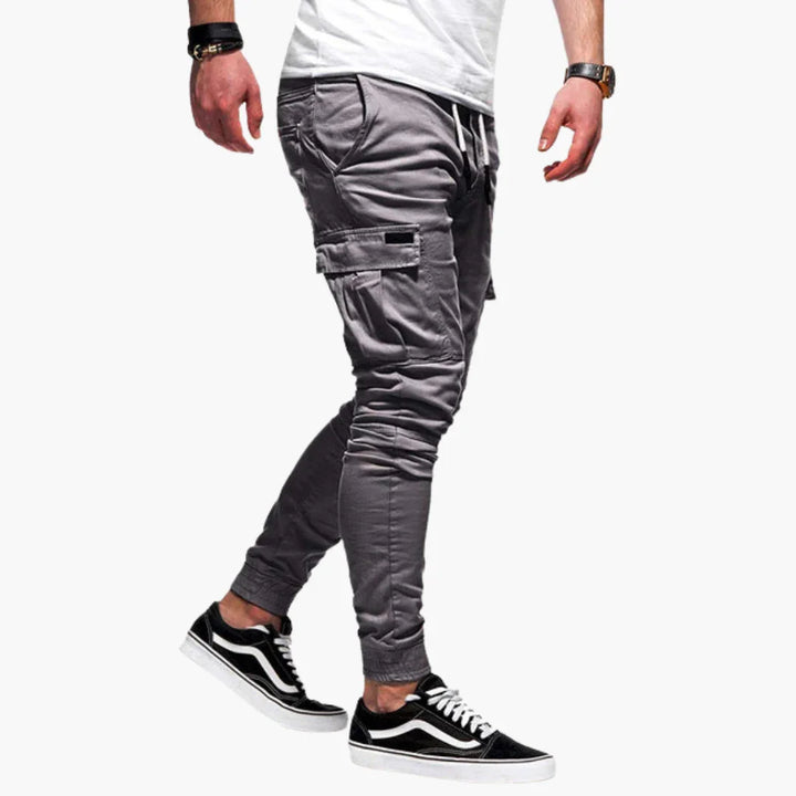 Męskie spodnie typu cargo z troczkiem w pasie i elastycznymi mankietami